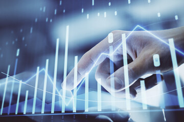 Multi exposure of man's hands holding and using a digital phone and forex graph drawing. Financial market concept.