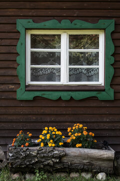 Window of a wooden house in Masuria/ Poland