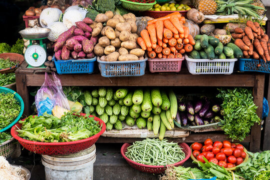 Stack of fruits and vegetables in vietnamese local market