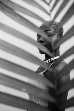 Vertical black & white image of an African American woman