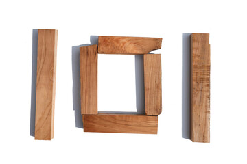 The number 101 is made of wood on a white background board