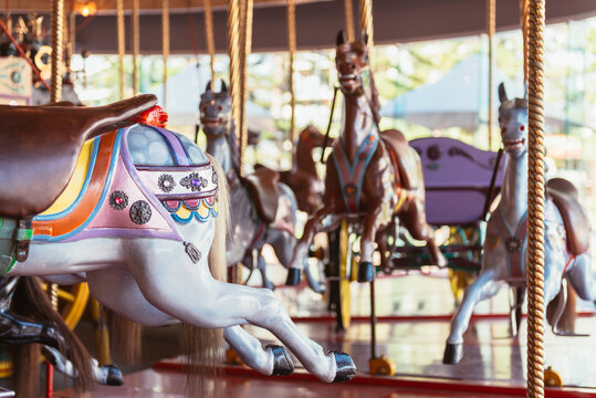 vintage looking carousel with horses
