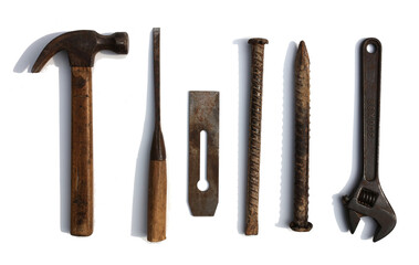 Hammer, wrench and other tools on white background board