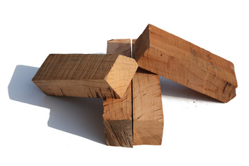 Four pieces of wood on a white background board