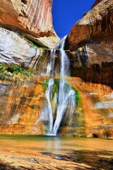 Lower Calf Creek Falls Waterfall colorful views from the hiking trail Grand Staircase Escalante...