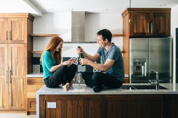 Young couple celebrating new home