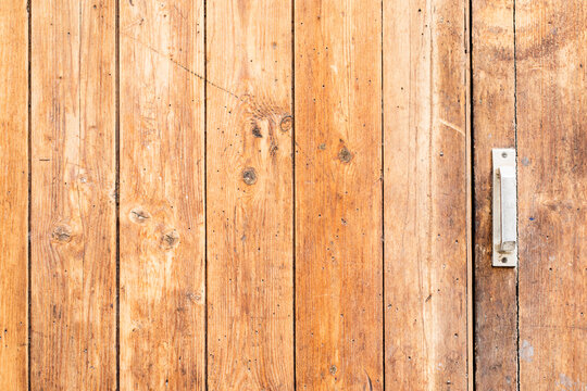 Closeup shot of texture of wooden door