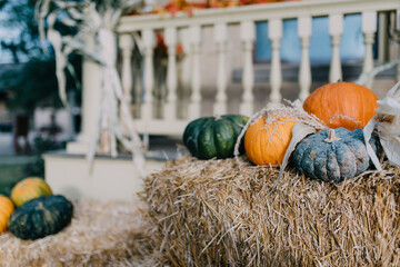 Pumpkins on the porch of a country home
