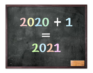 Fototapeta premium 2020 -2021 change represents the new year 2021. Blackboard display 2020 + 1 = 2021