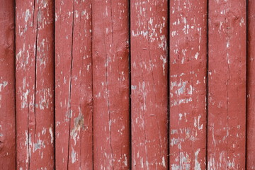 Wood Fence with peeling red paint