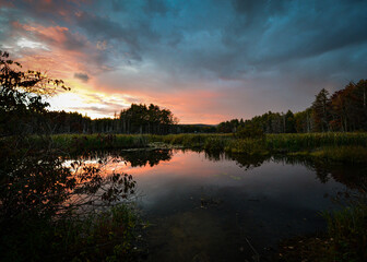 Obraz premium sunset over the river