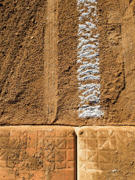 Detail of first base and freshly paint white boundary line on baseball field