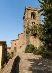Obraz premium Old stone medieval tower Torre Della Campanaria in Montecatini Alto, Tuscany, Italy