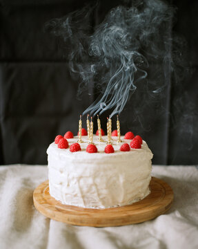 Cake with snuffed out candles