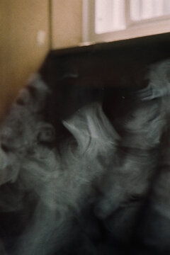 Smoke by the window, fire in the sky