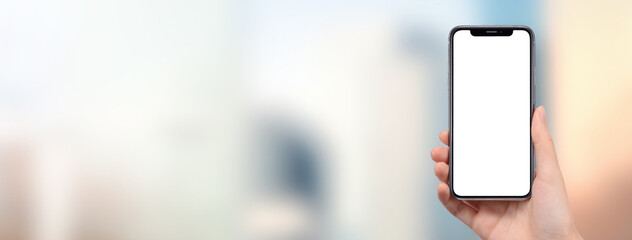 街中でスマートフォンを持っている女性の手の画像合成用素材