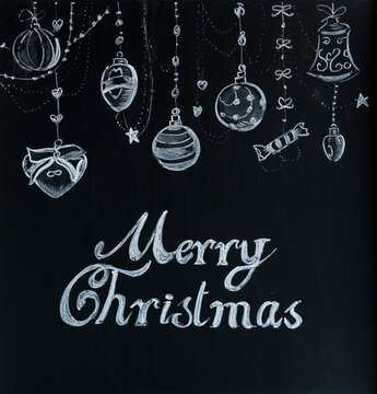 Merry Christmas written on a chalkboard