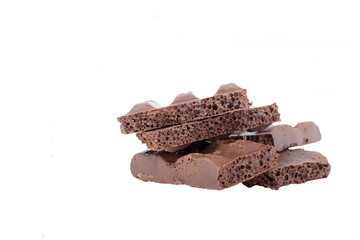 milk chocolate on a chocolate background