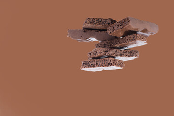 milk chocolate on a chocolate background