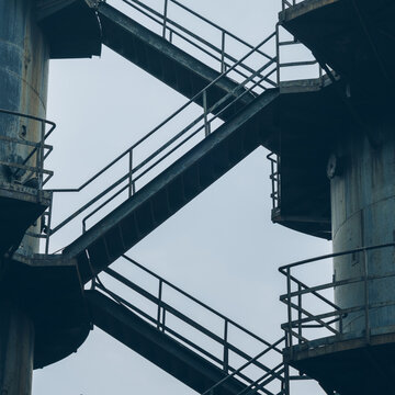 Fototapeta stairs of abandoned industrial factory.
