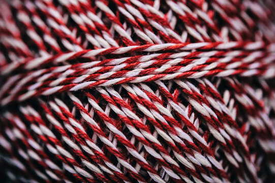 Detail of a Red and White Striped Thread