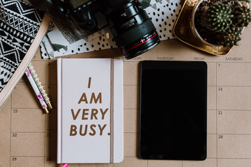 Daily planner with smart tablet and coffee