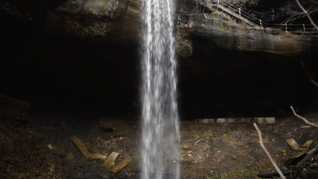 Tilt-down of a small waterfall in a canyon