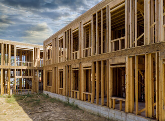 Building of New Home Construction exterior wood beam construction