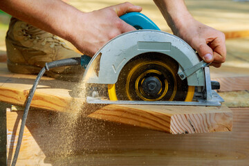 Circular saw carpenter using for wood beam