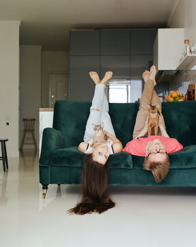 Couple sitting on sofa at home