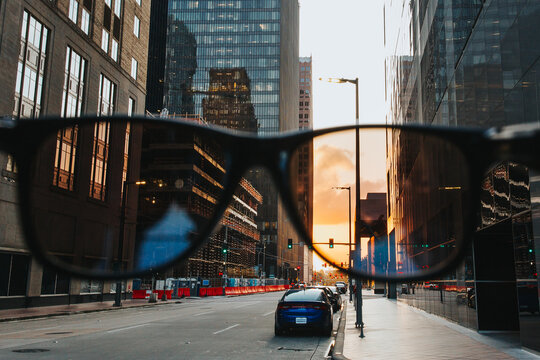 Looking through sunglasses at a city street in Houston, Texas
