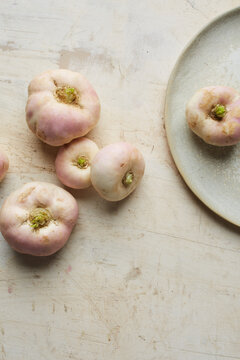 Family of pan cai turnips and a ceramic plate