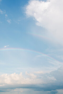 rainbow in a blue sky