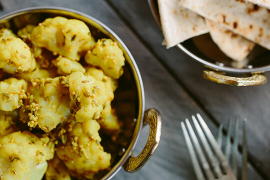 An indian dish of cauliflower cooked with whole spices