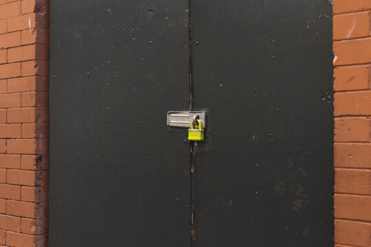 Padlock on warehouse door