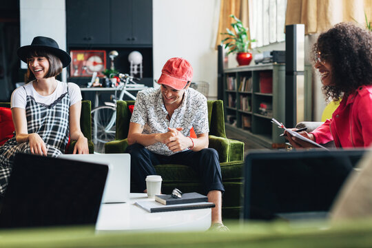 Creative business people discussing in office.