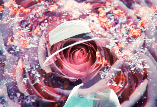 Young asian woman wearing a white hat double exposed with a close up of a rose