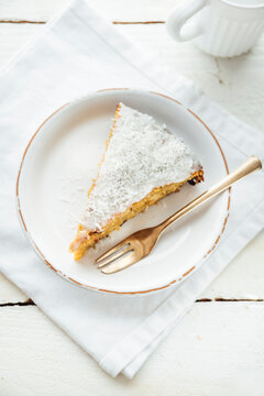 Food: Carrot, pineapple and coconut cake with nuts and coconut f