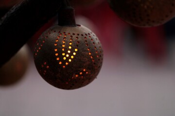 lightening ball hanging on a tree