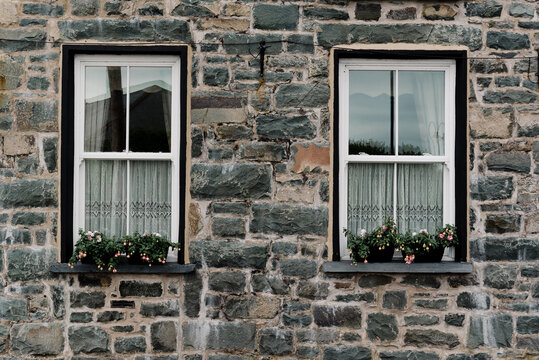 two windows on stone house