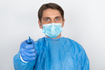Young male doctor with scrubs