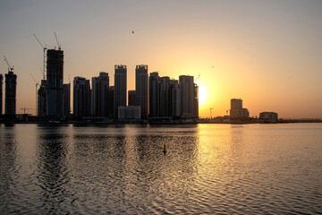 Sunrise in Jadaf area of Dubai, view of Dubai creek Harbor construction of which is partially completed.