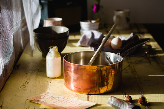 A kitchen scene where custard is being made.