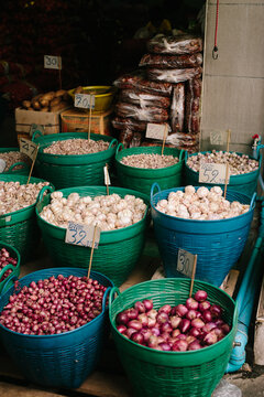 Onions and garlic for sale in a market in Thailand