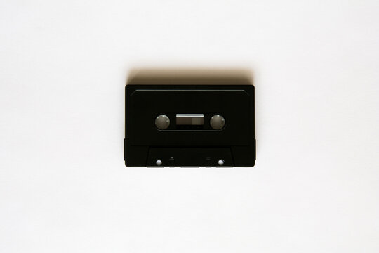 Black cassette tape on white background