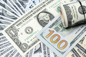 The U.S. dollars banknotes of the united States of America. The stack of money for the financial concept of earnings or business concept.