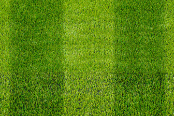 The detail of artificial green grass soccer field for backgroud