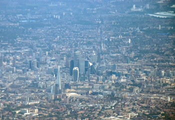 Overlooking the urban sprawl of the city of London from an airplane 