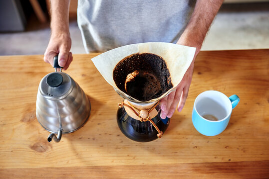 Man preparing morning coffee