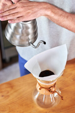 Man preparing morning coffee